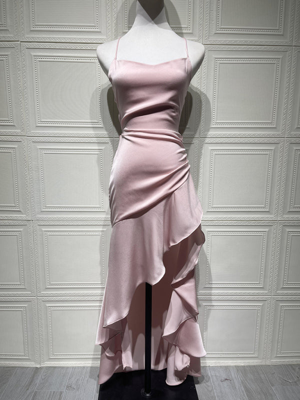Sexy halter dress with ruffled, irregular hem.
