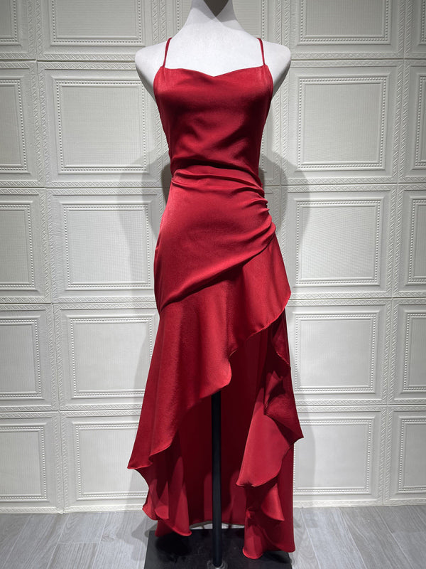 Sexy halter dress with ruffled, irregular hem.